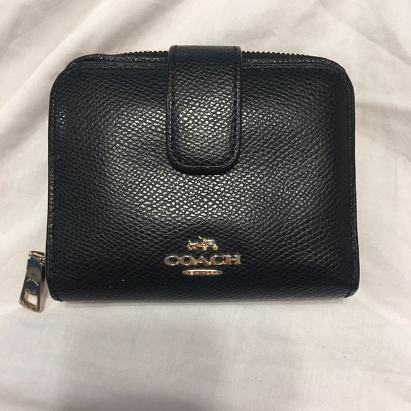 Coach Handbags - Black zip around coach wallet medium